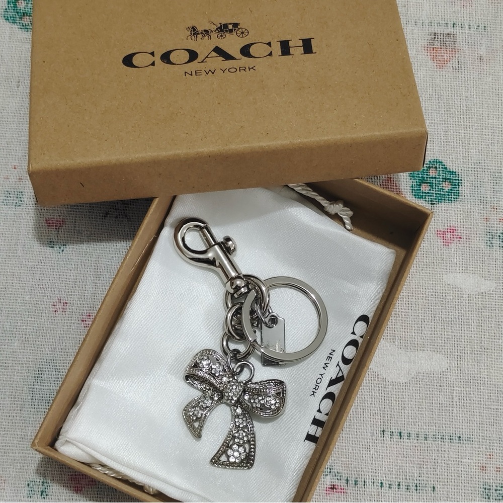 Coach Silver Tone Bow Keychain with Crystals